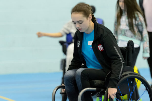 Person playing wheelchair football